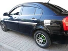 Накладка на лючок бензобака OmsaLine (нерж.) для Hyundai Accent 2006-2010 рр - 1