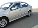 Бічні спідниці Sedan (під фарбування) для Opel Astra H 2004-2013 рр - 1