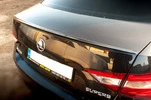 Спойлер LIP (Sunplex, чорний) (119,2см* 7,3см) для Skoda Superb 2015-2024 рр - 1