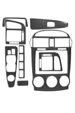 Накладки на панель 2004-2006 (Sedan) Карбон для Kia Cerato 1 рр