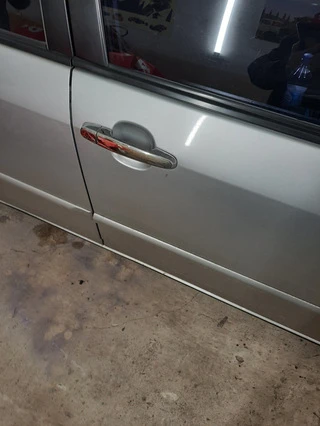 Накладки на ручки (4 шт) Carmos - турецька сталь для Toyota Corolla 2002-2007 рр