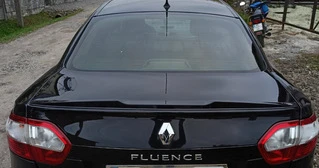 Спойлер LIP (Sunplex, чорний) (125,4см *7,2см) для Renault Fluence 2009-2016 рр