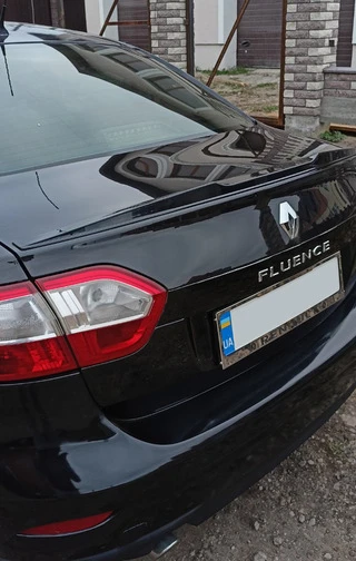 Спойлер LIP (Sunplex, чорний) (125,4см *7,2см) для Renault Fluence 2009-2016 рр