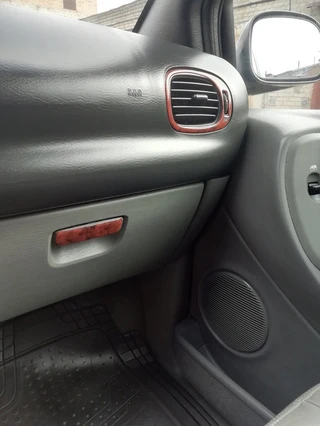 Накладки на панель (Meric) Дерево для Chrysler Voyager 2001-2007 рр