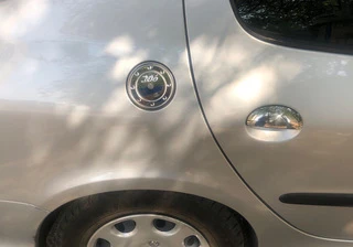 Накладка на лючок бензобака (нерж.) для Peugeot 206