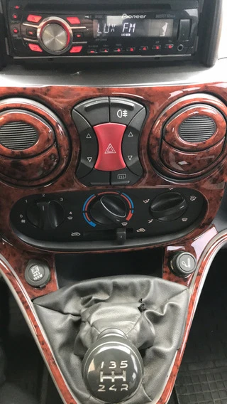 Накладки на панель Дерево для Fiat Doblo I 2005-2010 рр