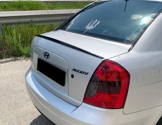 Спойлер LIP (Sunplex, чорний) (115,8см * 6,3см) для Hyundai Accent 2006-2010 рр