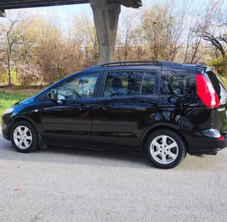 Накладки на арки (4 шт, чорні) 2005-2008, Металеві для Mazda 5