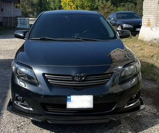 Накладка на передній бампер (під фарбування) для Toyota Corolla 2007-2013 рр