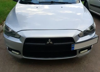 Підставка під номер (пластик) Чорний мат для Mitsubishi Lancer X 2008- рр