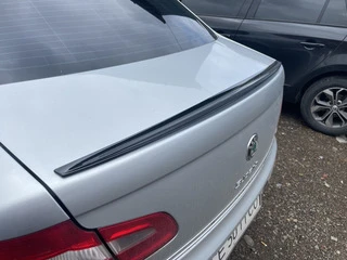 Спойлер LIP (Sunplex, чорний) (115,8см * 6,3см) для Skoda Superb 2009-2015 рр