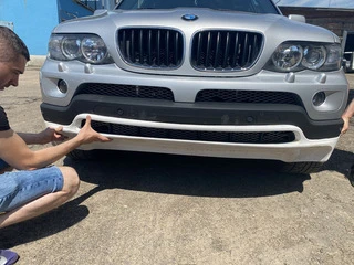 Накладка на передній бампер послерестайл (під фарбування) для BMW X5 E-53 1999-2006 рр