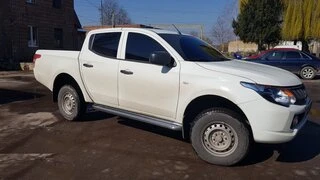 Бокові пороги Premium (2 шт., нерж.) &Oslash;60 для Mitsubishi L200 2015-2024 рр