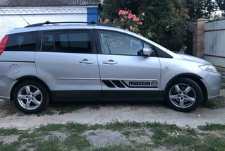 Накладки на арки (4 шт, чорні) 2005-2008, Металеві для Mazda 5