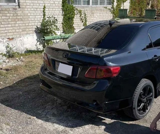 Спойлер (під фарбування) для Toyota Corolla 2007-2013 рр